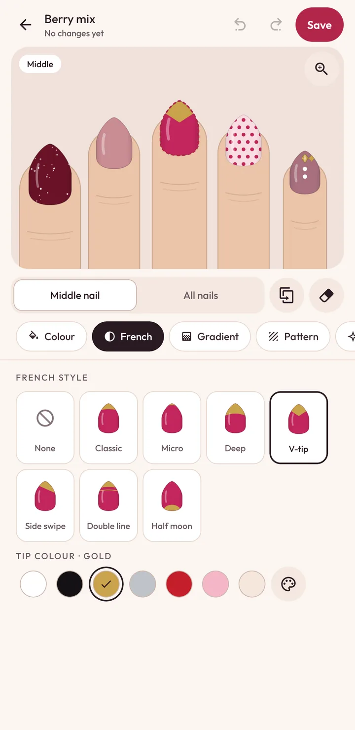 The French tool with seven tip styles and a row of tip colours; the middle nail has a gold V-tip.